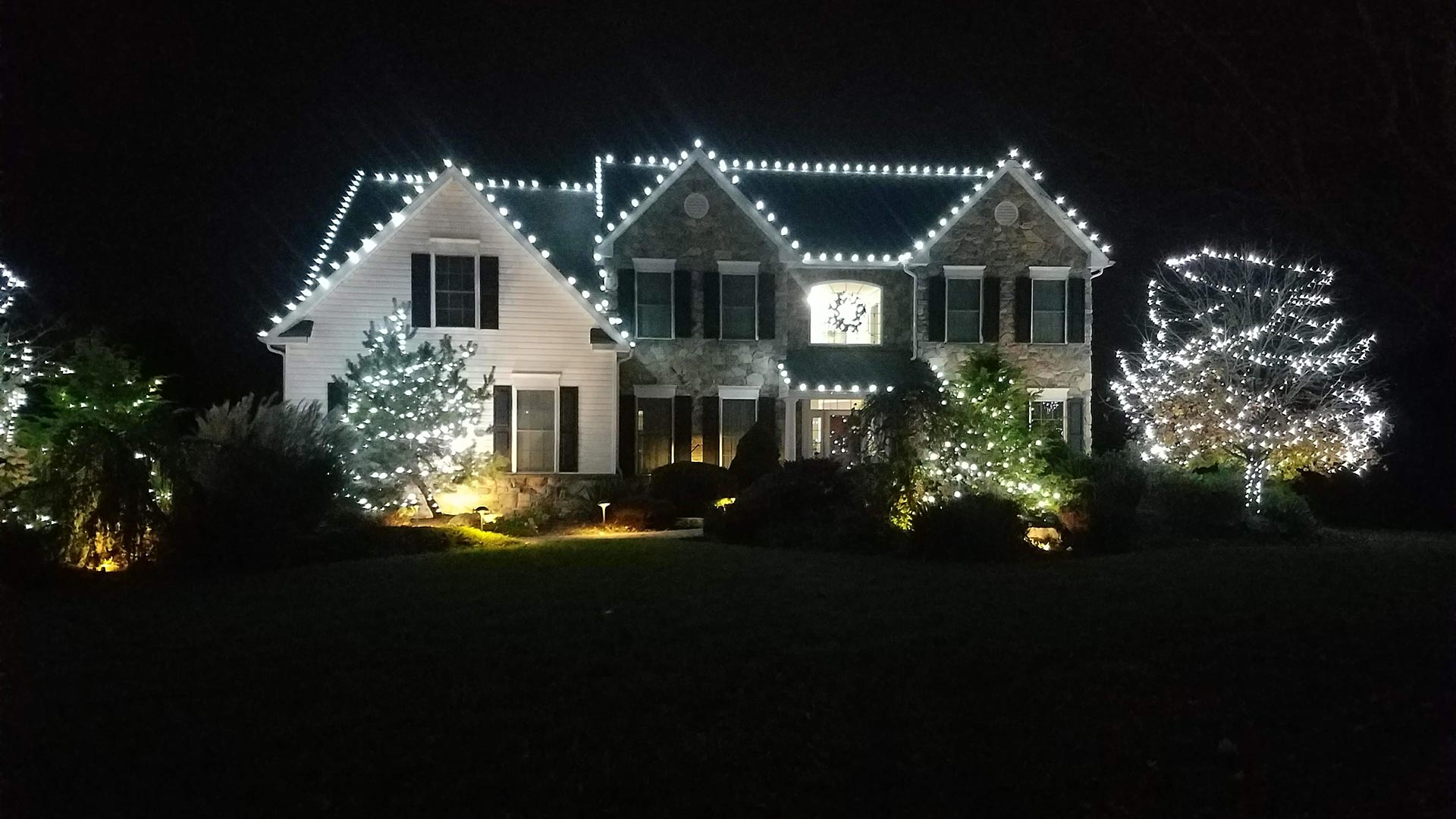 A home with holiday lights near Macungie, PA.