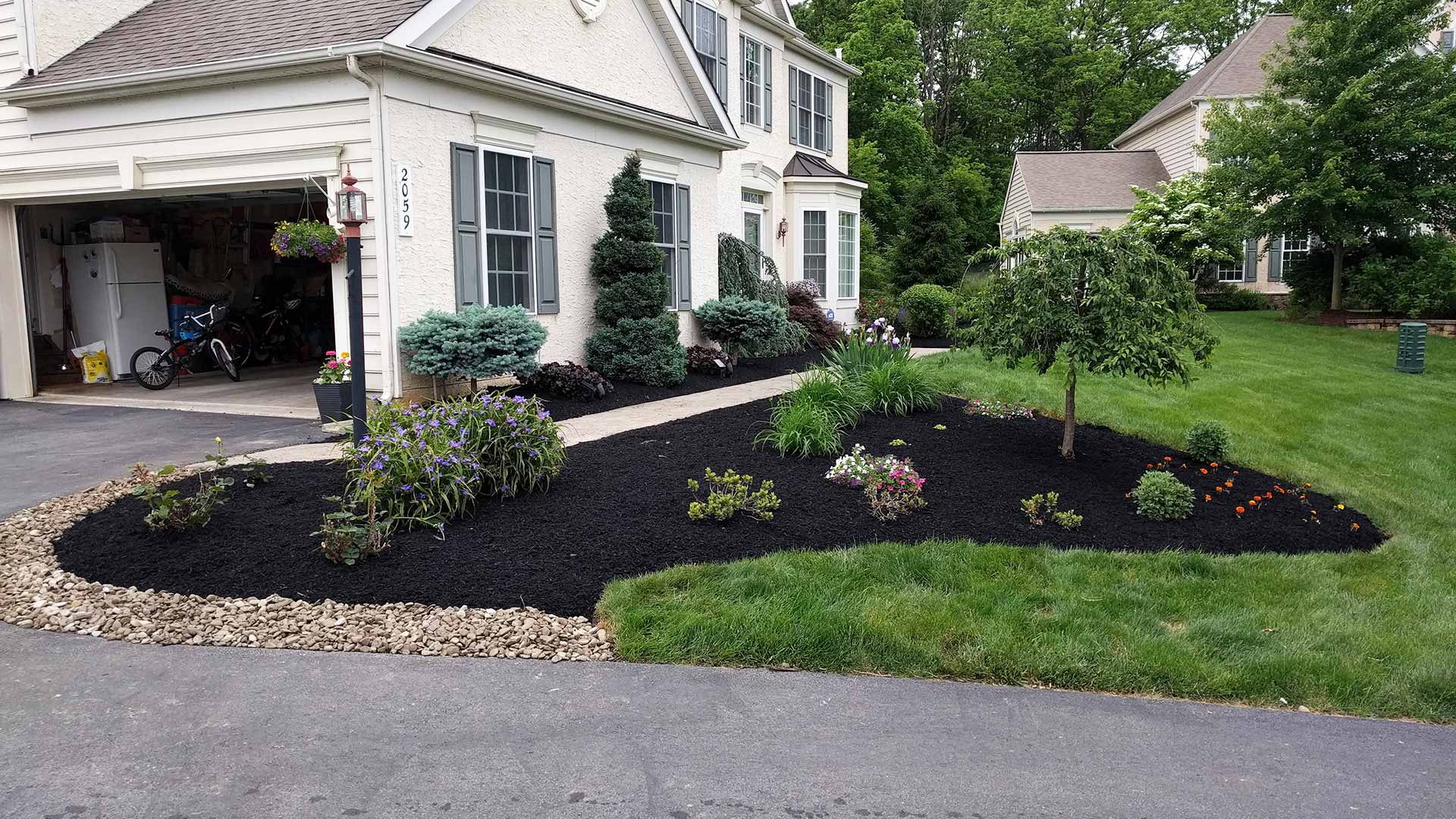 Well maintained landscape bed at a home in Zionsville, PA.
