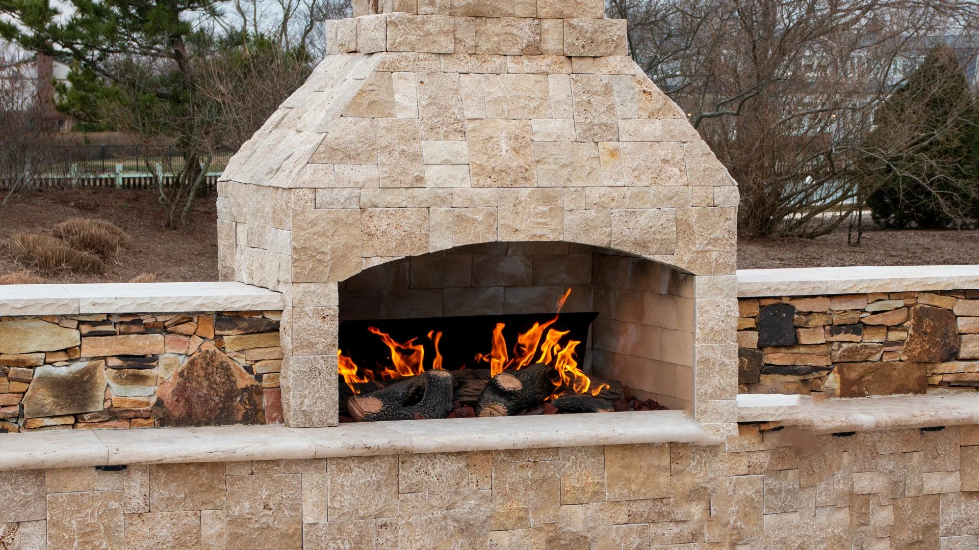 Is an Outdoor Fireplace a Safer Choice Than a Fire Pit?