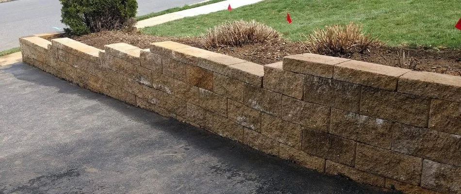 Block retaining wall along a driveway in Macungie, PA.