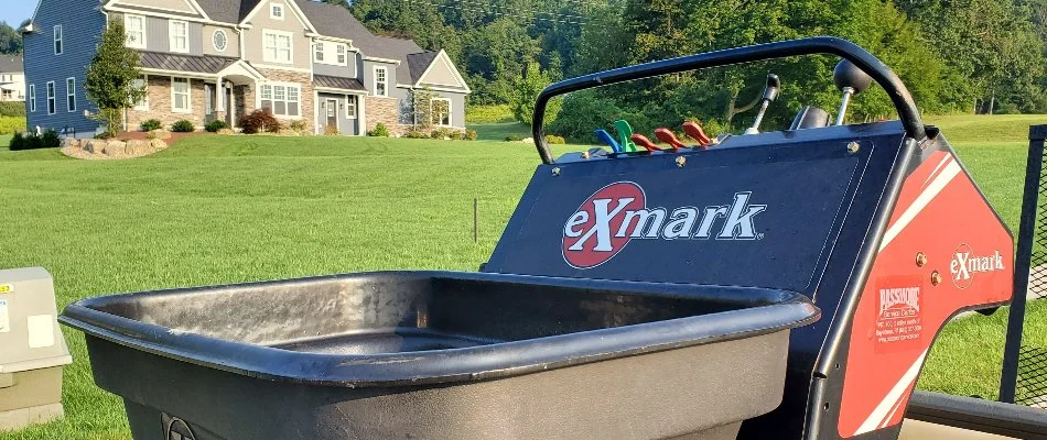 Granular fertilizer equipment in front of a yard in Macungie, PA.
