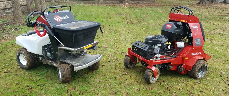 Aerator and weed control spreader displayed in lawn in Orefield, PA.