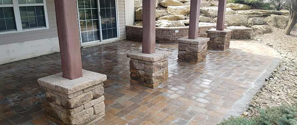 Custom paver patio construction at a home in Macungie, PA.