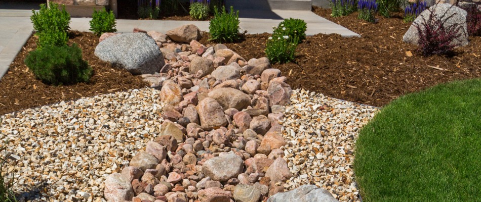 Dry creek bed installed for front lawn in Coopersburg, PA.