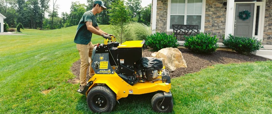 Our lawn care specialist aerating a lawn in Coopersburg, PA.