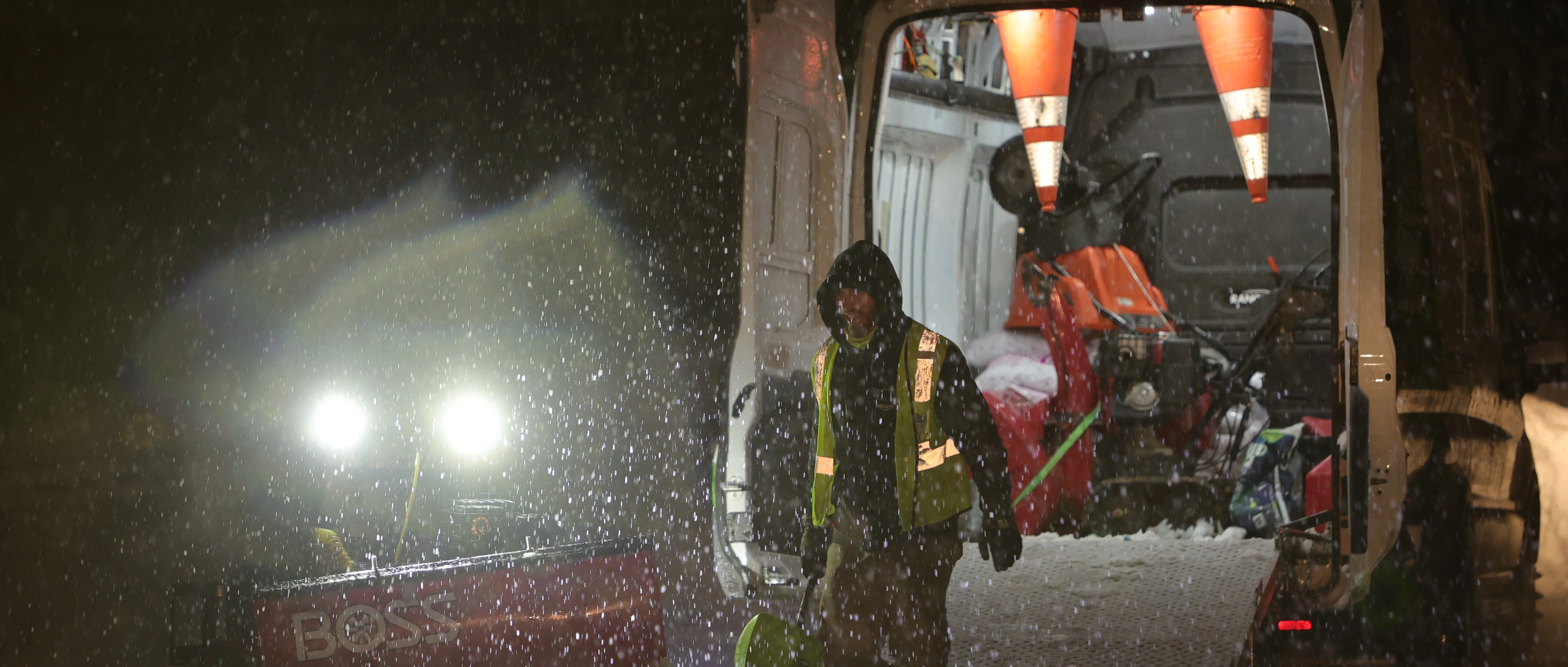 Professionals from Lehigh Valley Lawn removing snow from commercial property in Emmaus, PA.