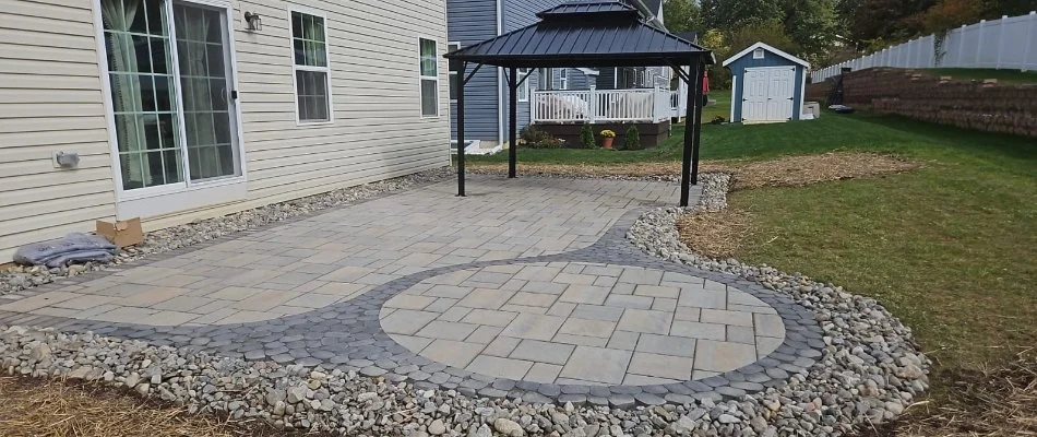 Paver patio in a backyard in Gilbertsville, PA.