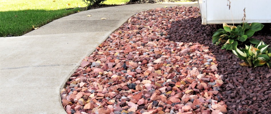 Rocks installed for landscape bed near walkway in Trexlertown, PA.